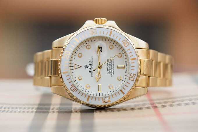  --     Rolex  Cartier